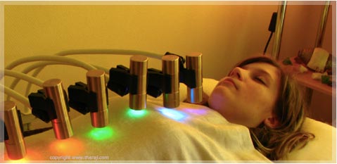Woman receiving Maharishi Light Therapy with Gems